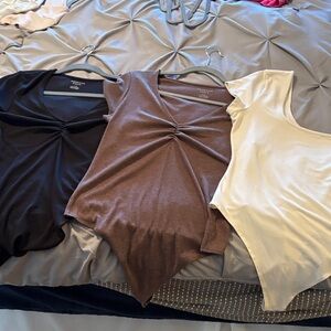 American eagle large Black, Brown, and Cream Bodysuits set of three